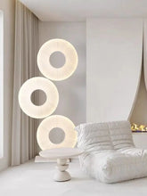 “Nordic circular multi-ring LED floor lamp in minimalist style”
