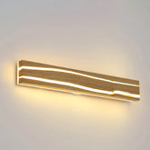 Modern wall light fixture on a neutral background