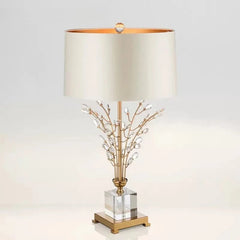 “Nordic crystal table lamp with gold accent and modern fabric shade”