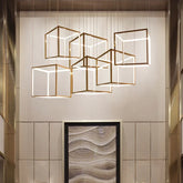 “Polished chrome geometric cube pendant for stylish interiors”