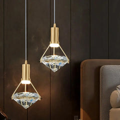 “Polished copper pendant lamp with sparkling crystal shade”