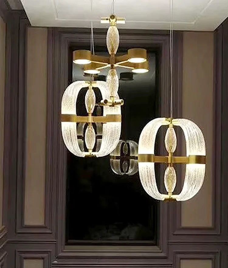 Sculptural postmodern art glass chandelier as a centerpiece for a high-ceiling staircase