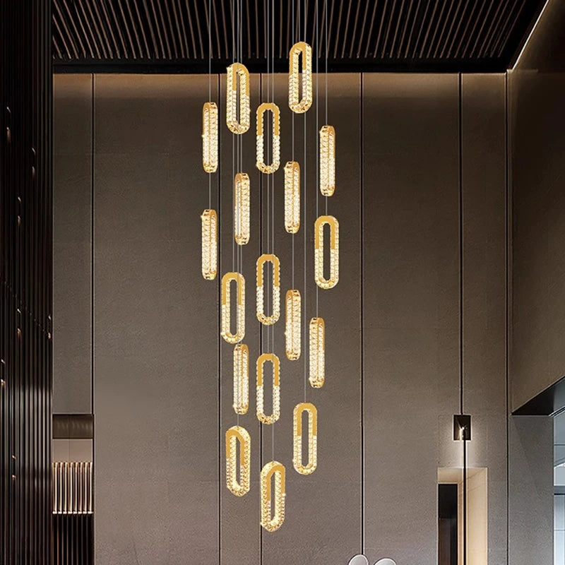 Modern chandelier hanging from the ceiling in a stylish interior setting.