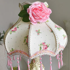 “Romantic resin nightstand lamp with embroidered fabric shade”