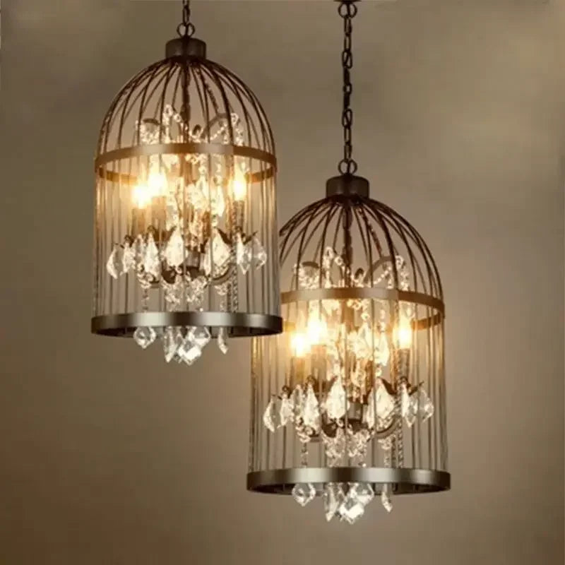 Two vintage-style chandeliers with crystal accents on a neutral background . Retro birdcage crystal chandelier for restaurant and living room.