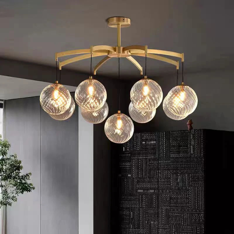 “Ribbed glass orb ceiling light with vortex art deco design”