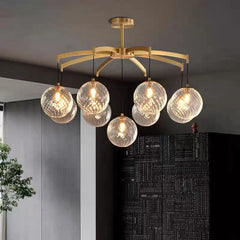 “Ribbed glass orb ceiling light with vortex art deco design”