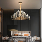 Luxurious bedroom with a chandelier, bed, and dark walls