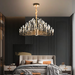 Luxurious bedroom with a chandelier, bed, and dark walls