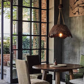 Scandinavian style pendant lamp illuminating a modern living corner