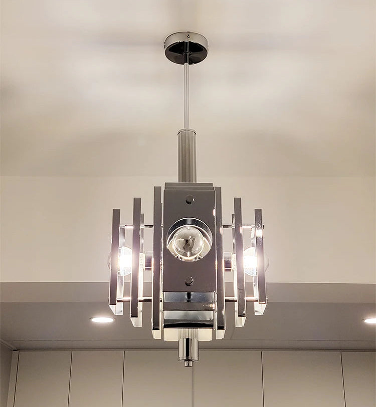 “Space art stainless steel chandelier with geometric accents”