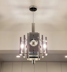 “Space art stainless steel chandelier with geometric accents”