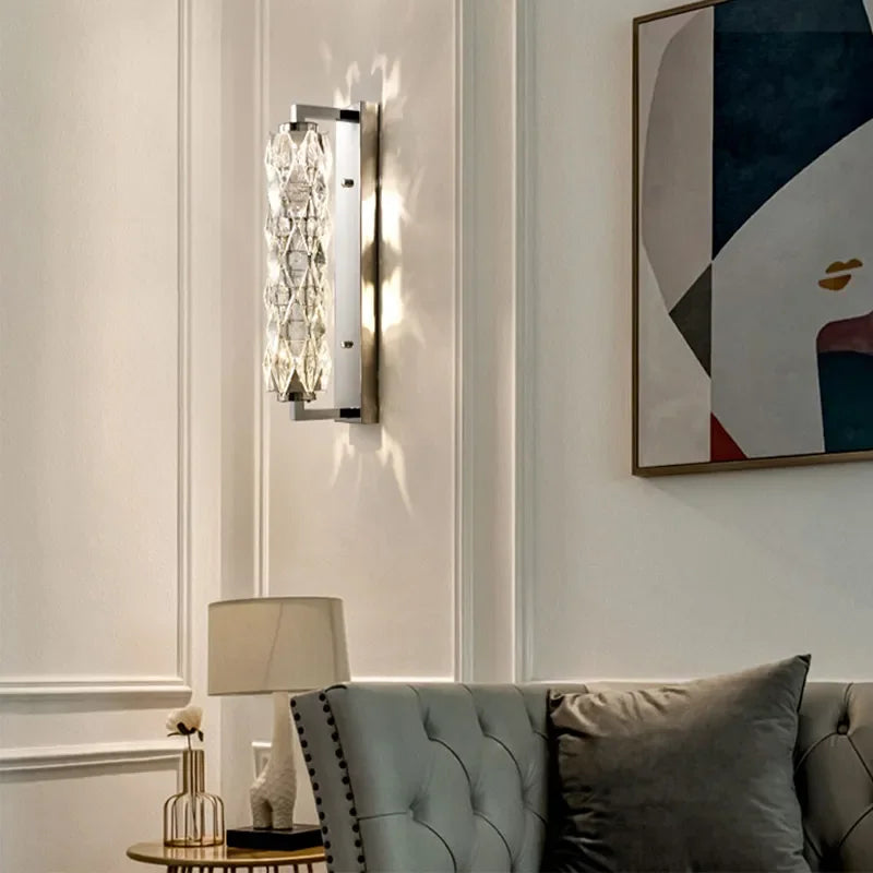 Slim vertical wall lamp with crystal shade and up and down glow for staircase lighting
