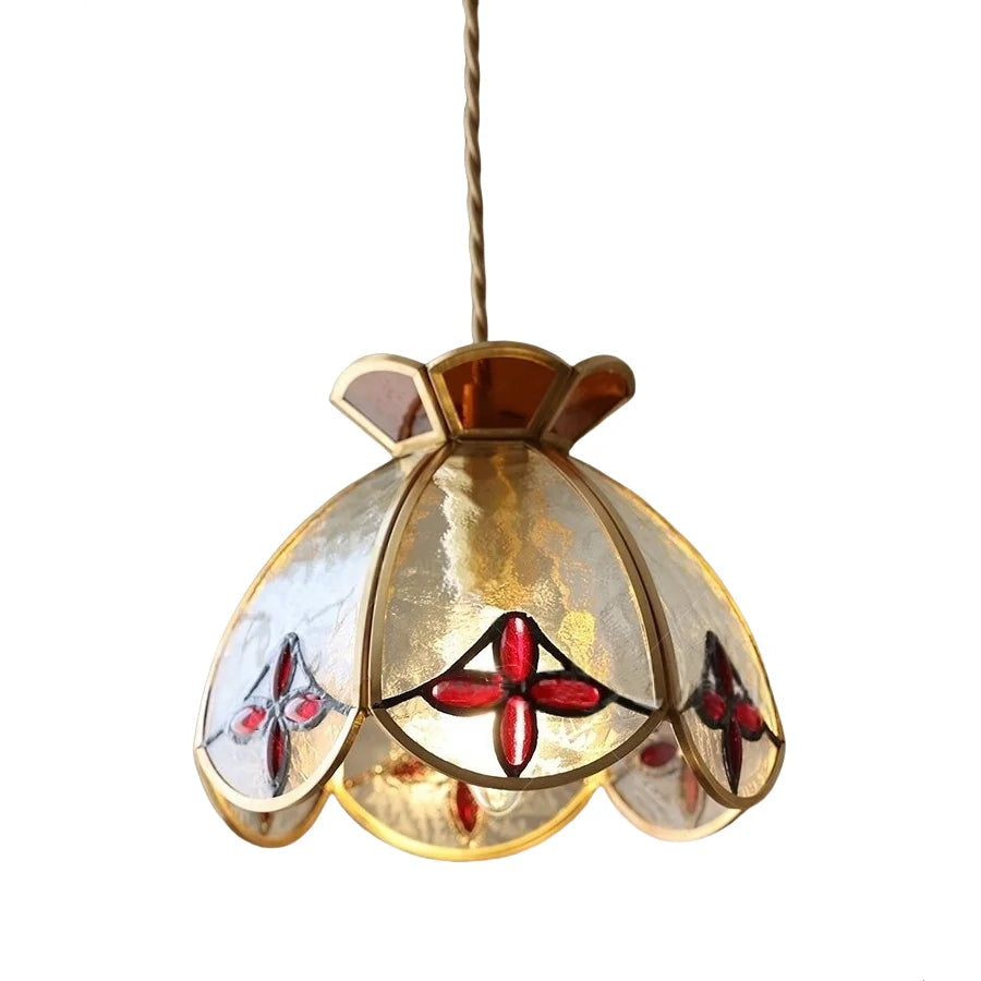 Decorative pendant light with a floral design on a white background. Tiffany crown diamond glass pendant light in Nordic vintage style.