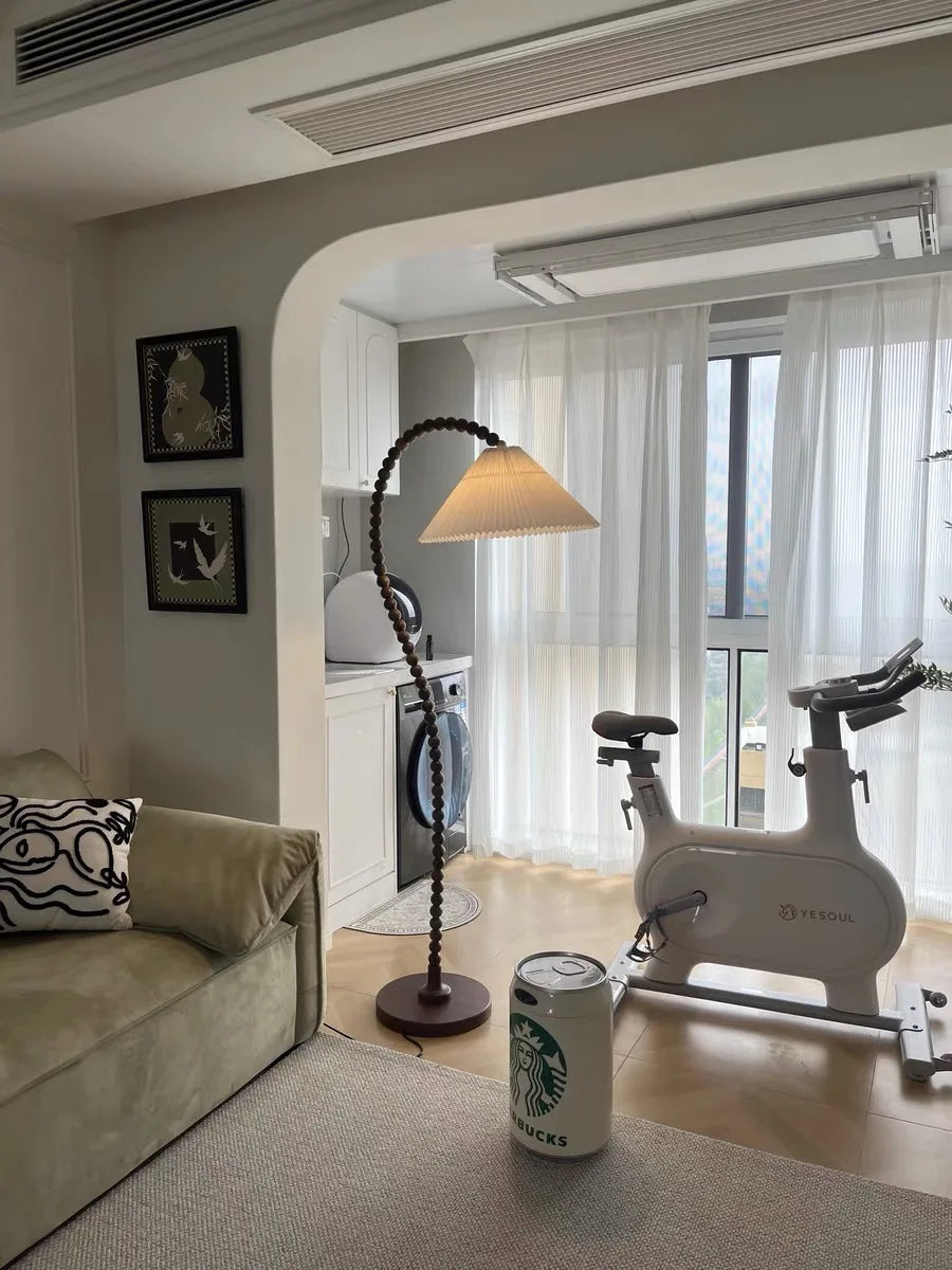 “Mid-century reading lamp with cloth shade and wood stand”