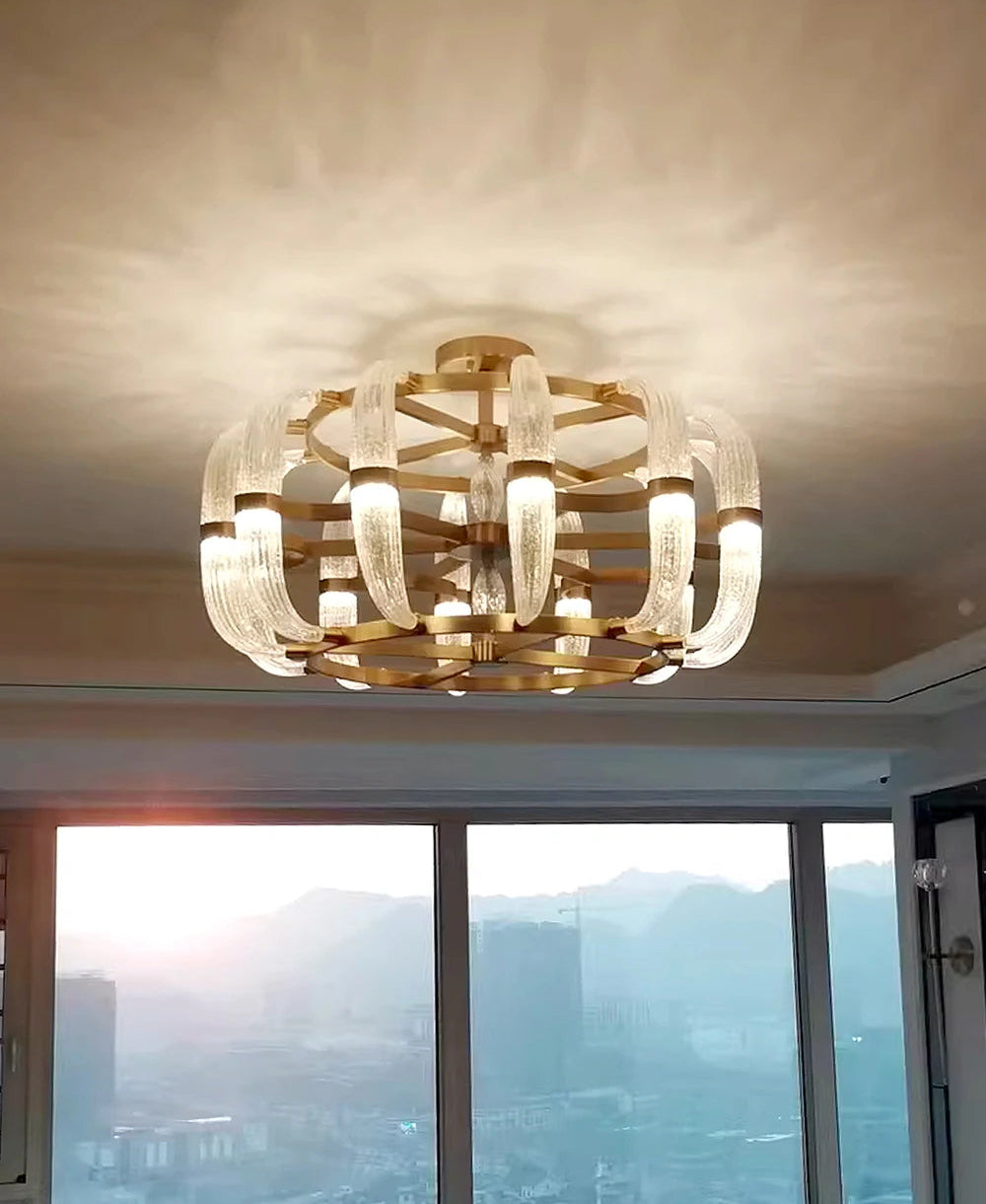 Wedge base LED chandelier lighting up an open contemporary living room