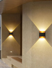 “Slim white up and down wall light mounted in a contemporary corridor.”