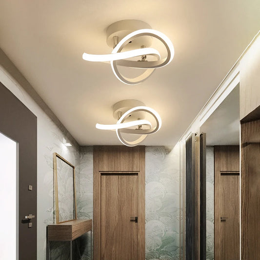 Close-up of the black swirl design on a modern LED semi-flush ceiling light