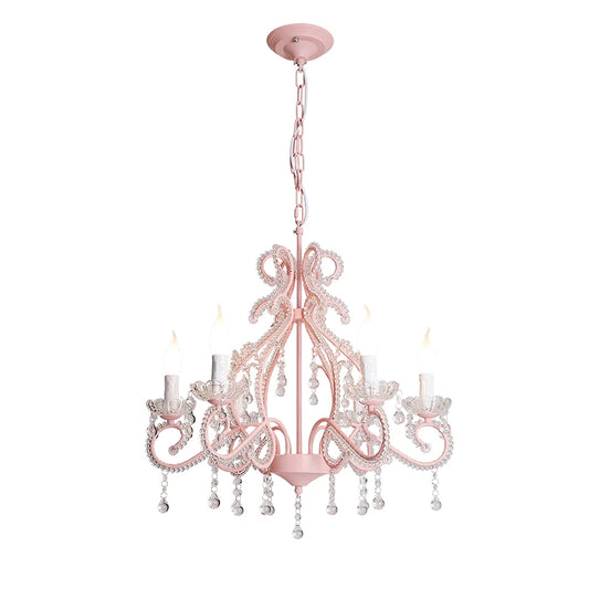 Pink chandelier with multiple arms, crystal droplets, and candle-style lights, isolated on a white background
