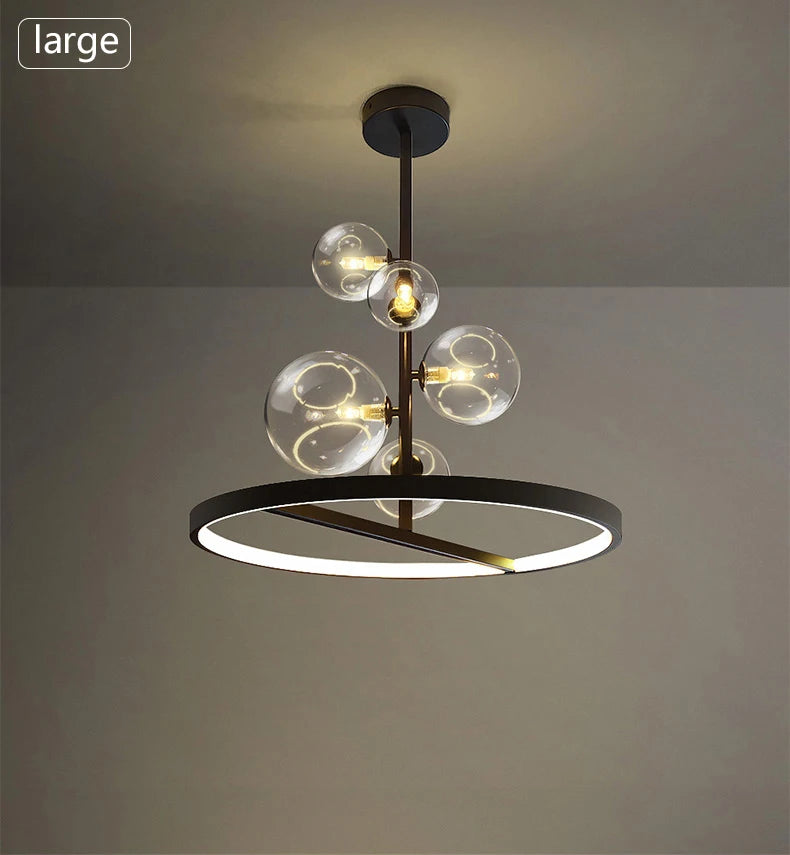 Modern ceiling light fixture with glass bulbs on a gray background
