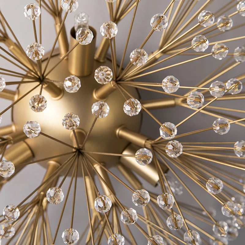 Gold chandelier with crystal-like beads on a neutral background