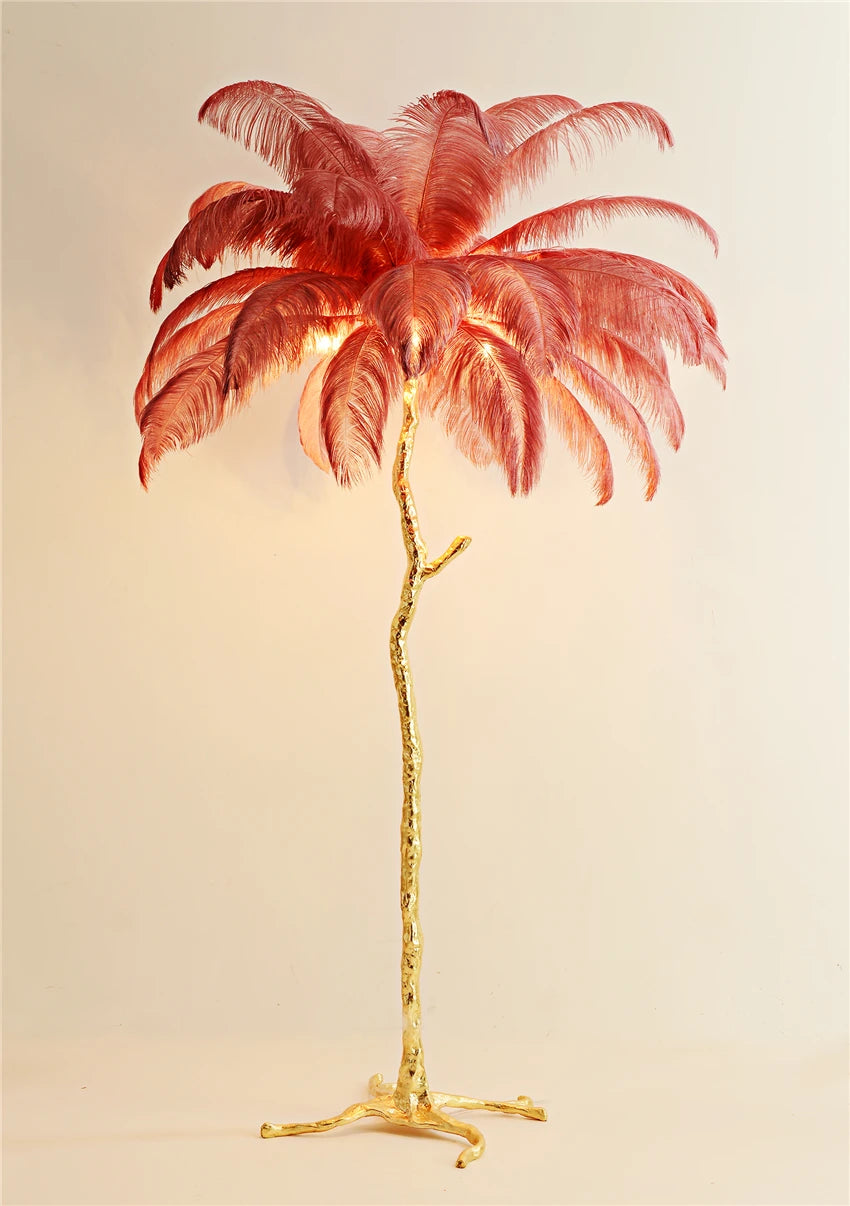 Pink feathered palm tree lamp on a beige background