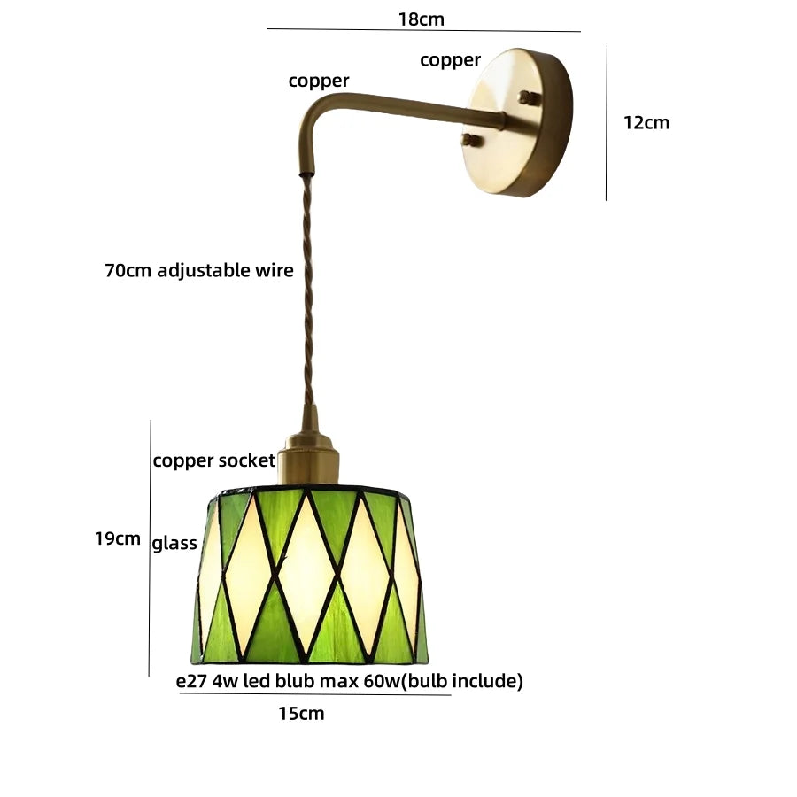 Pendant light with green glass shade and adjustable arm, featuring measurements on a white background.