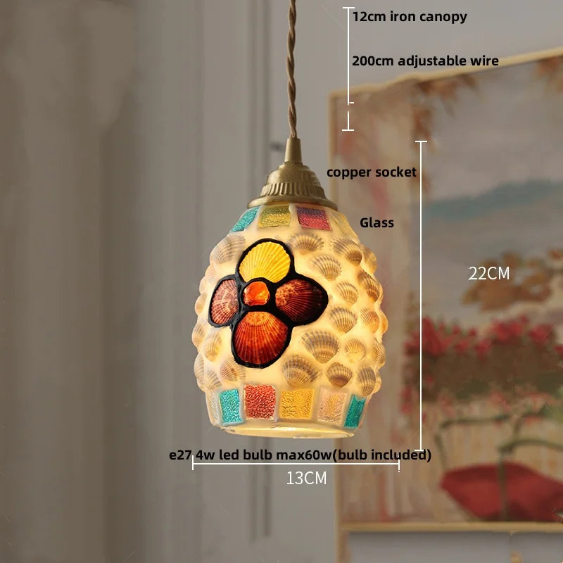 Decorative pendant light with measurements and details on a neutral background