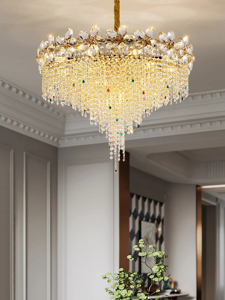 Close-up view of the gold frame and intricate crystal detailing on a petal-shaped chandelier, showcasing the craftsmanship.