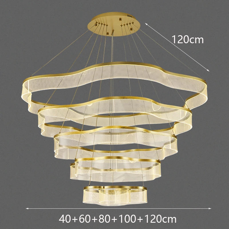 Modern chandelier with gold finish on a dark background