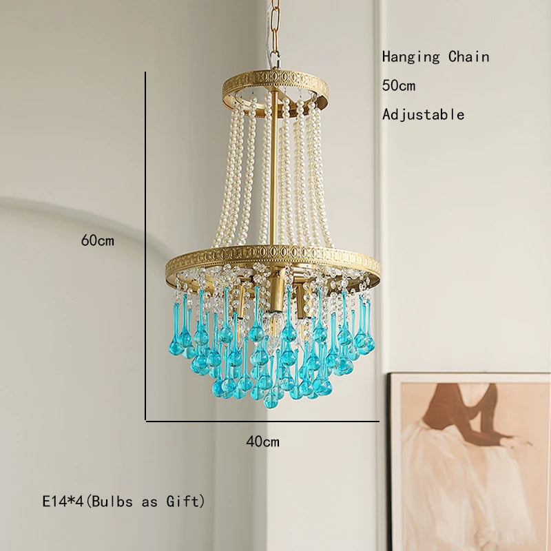 Chandelier with blue crystals and measurements on a neutral background