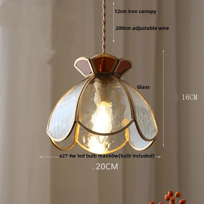 Pendant light with glass shade and metal frame, featuring dimensions and bulb information.