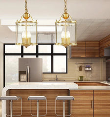 Gold Lantern Pendant Light with Clear Glass Shade and Metal Frame