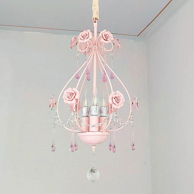 Side view of a pink floral crystal pendant light showing the E14 bulb sockets and crystal details.