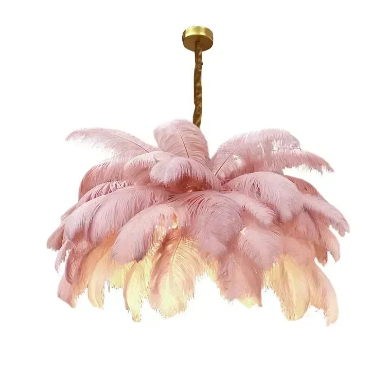 Pink feathered chandelier with gold accents on a white background