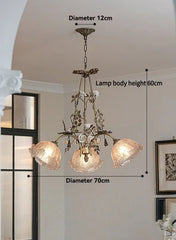 Gold Metal Chandelier with Rose Bud Accents and Frosted Glass Shades
