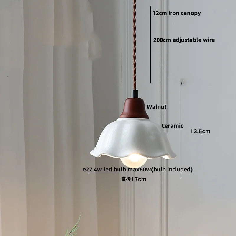 Pendant light with dimensions and bulb information on a neutral background