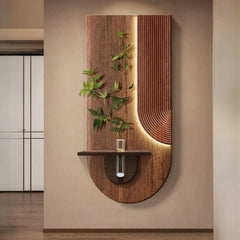 Another variation of the wood grain wall light with a more abstract curved LED channel and a plant holder, showcasing its artistic design.