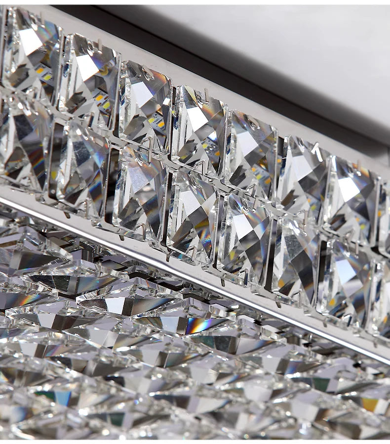 Close-up of a decorative crystal strip with a metallic frame.