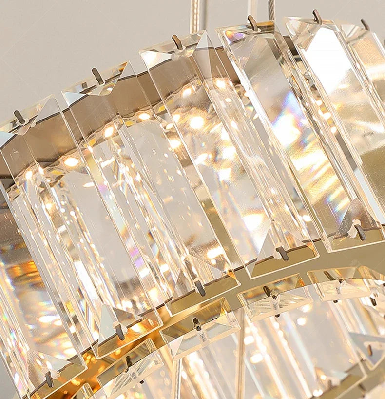Chandelier with clear crystal panels and gold frame