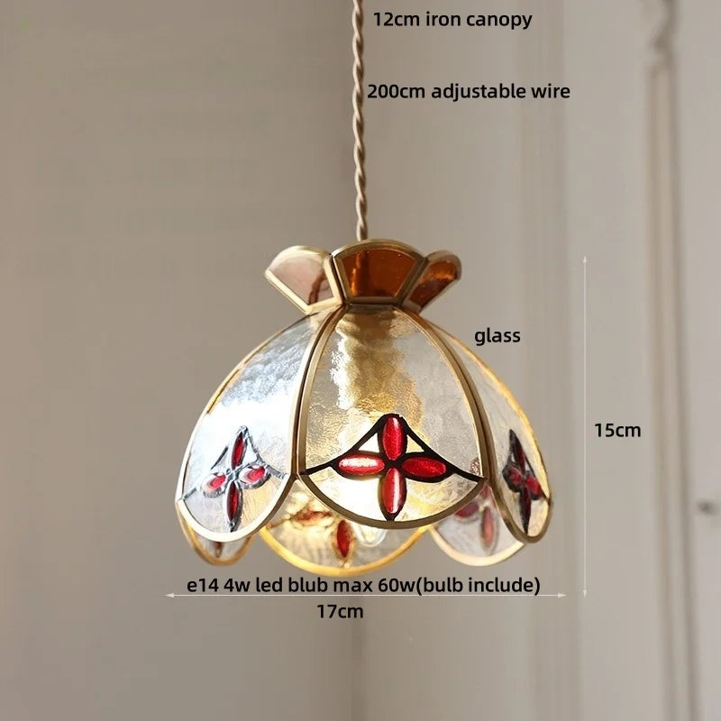 Decorative pendant light with stained glass design, measurements indicated.