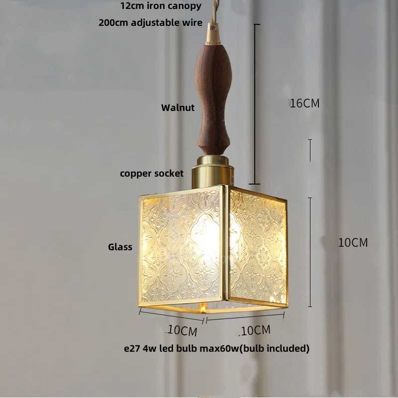 Pendant light with measurements and details on a gray background