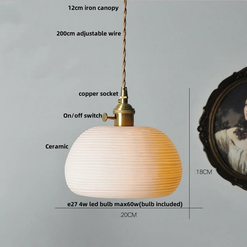 Pendant light with labeled components on a gray background
