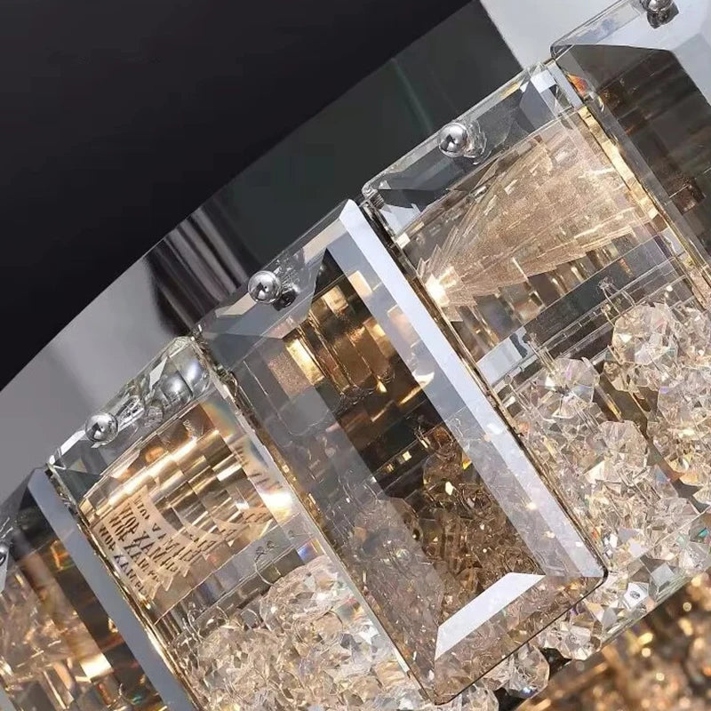Detailed view of the faceted crystals and polished chrome frame of a semi-flush ceiling light, showing intricate craftsmanship.