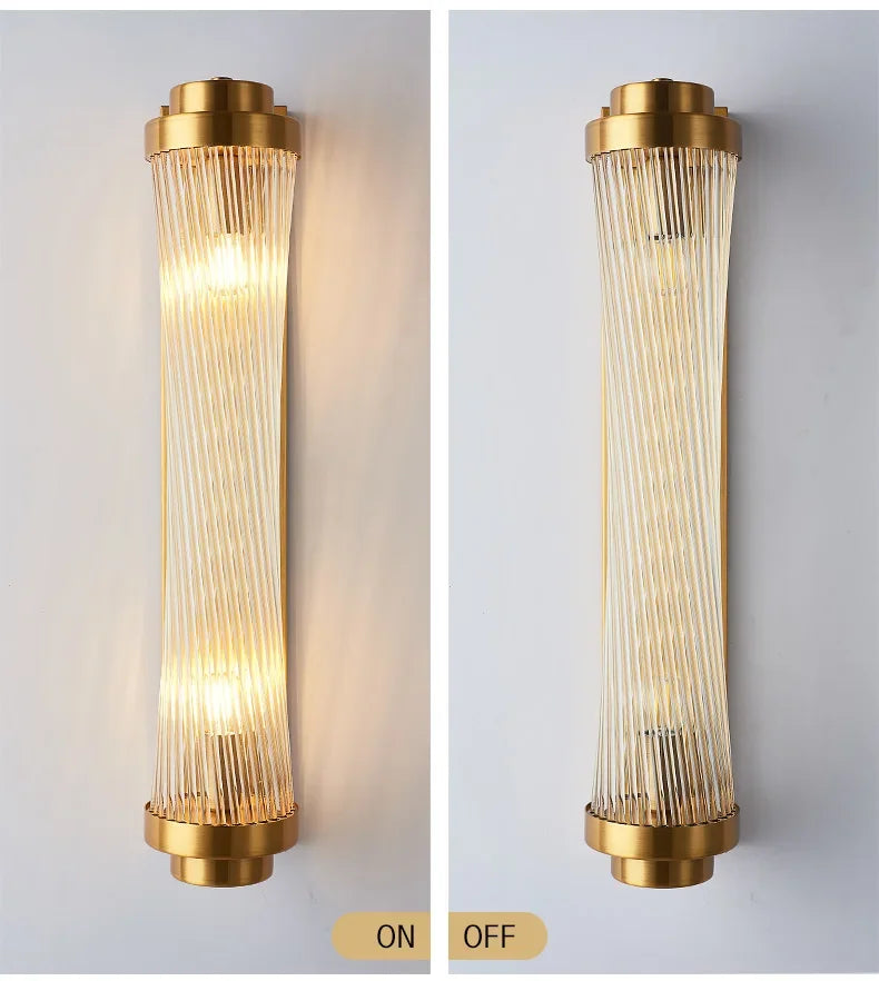 Gold wall sconce with glass shade on a light gray background, showing 'ON' and 'OFF' states.