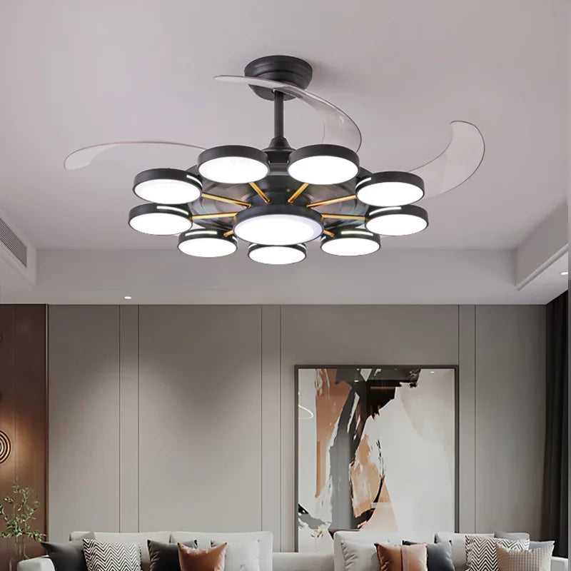 Modern chandelier in a living room setting with neutral walls and a sofa.