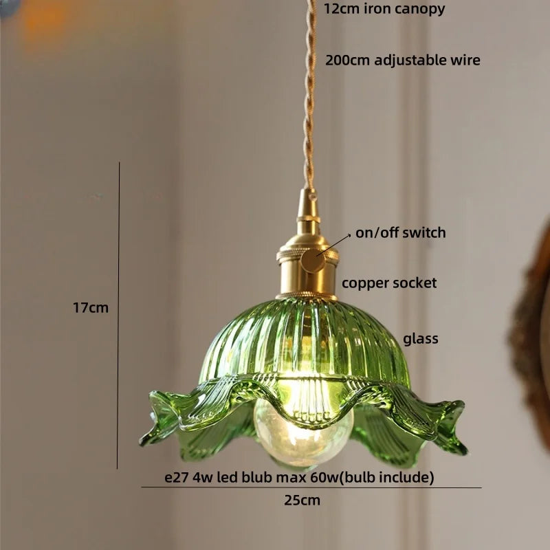 Green pendant light with labeled parts on a neutral background