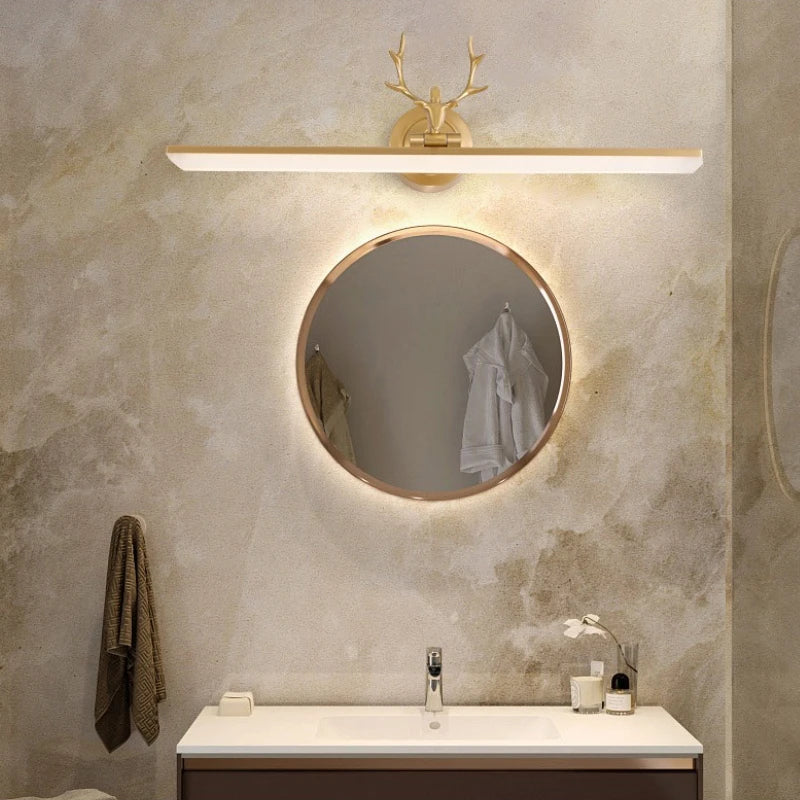 Bathroom setup with round mirror, light fixture, and sink.