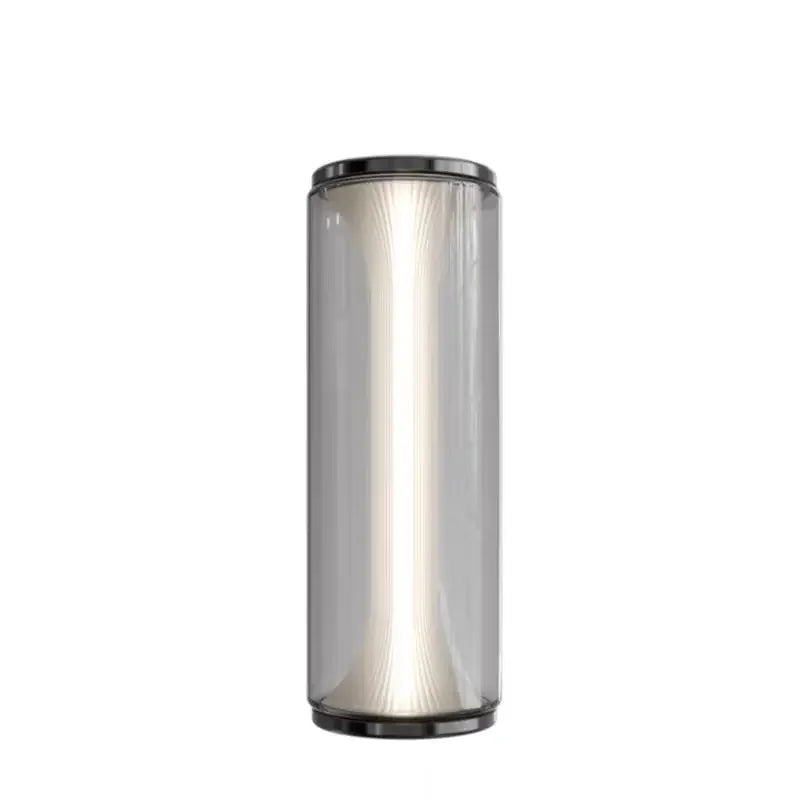 Cylindrical lamp with smoked glass shade on a white background