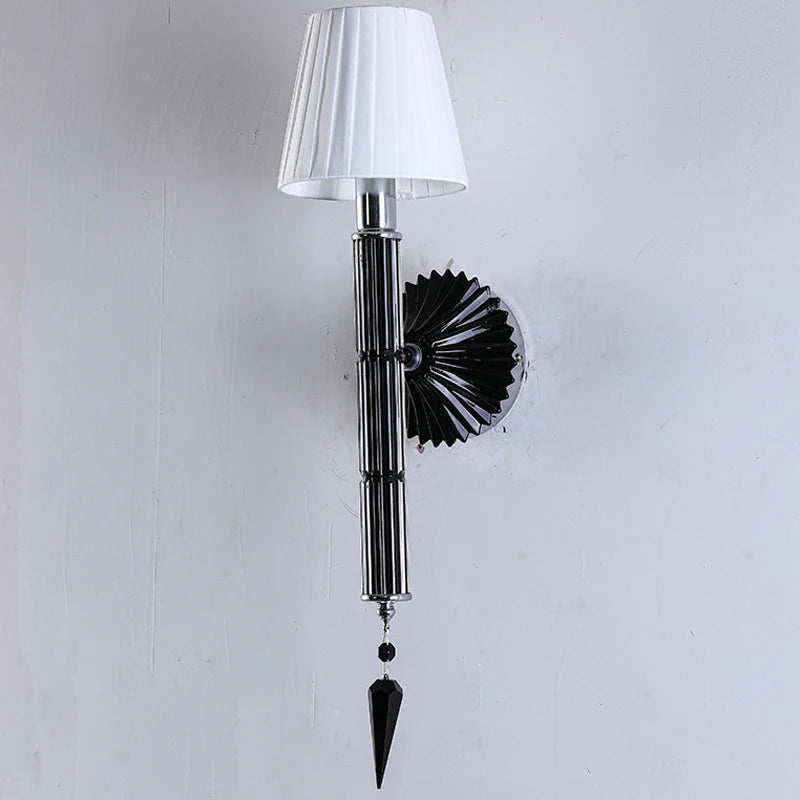 Close-up of the champagne crystal detail on the wall sconce.